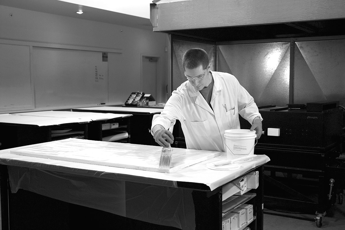 primer application on a large kiln shelf